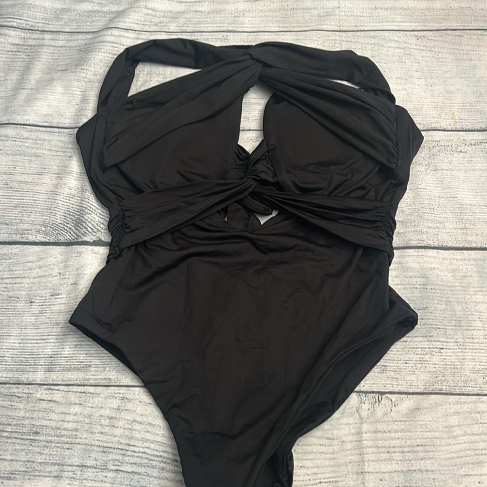 NEW Becca Twist Front One Piece - size M