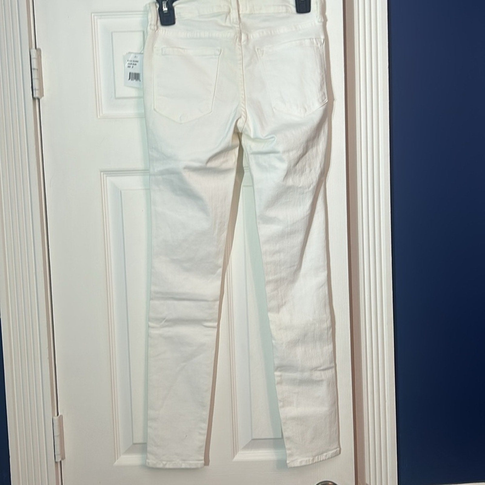 FRAME Denim Blanc Le Skinny De Jeanne Mid Rise Distressed White Jean - size 27