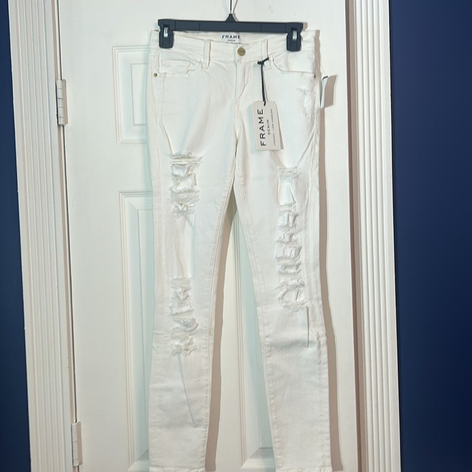 FRAME Denim Blanc Le Skinny De Jeanne Mid Rise Distressed White Jean - size 27