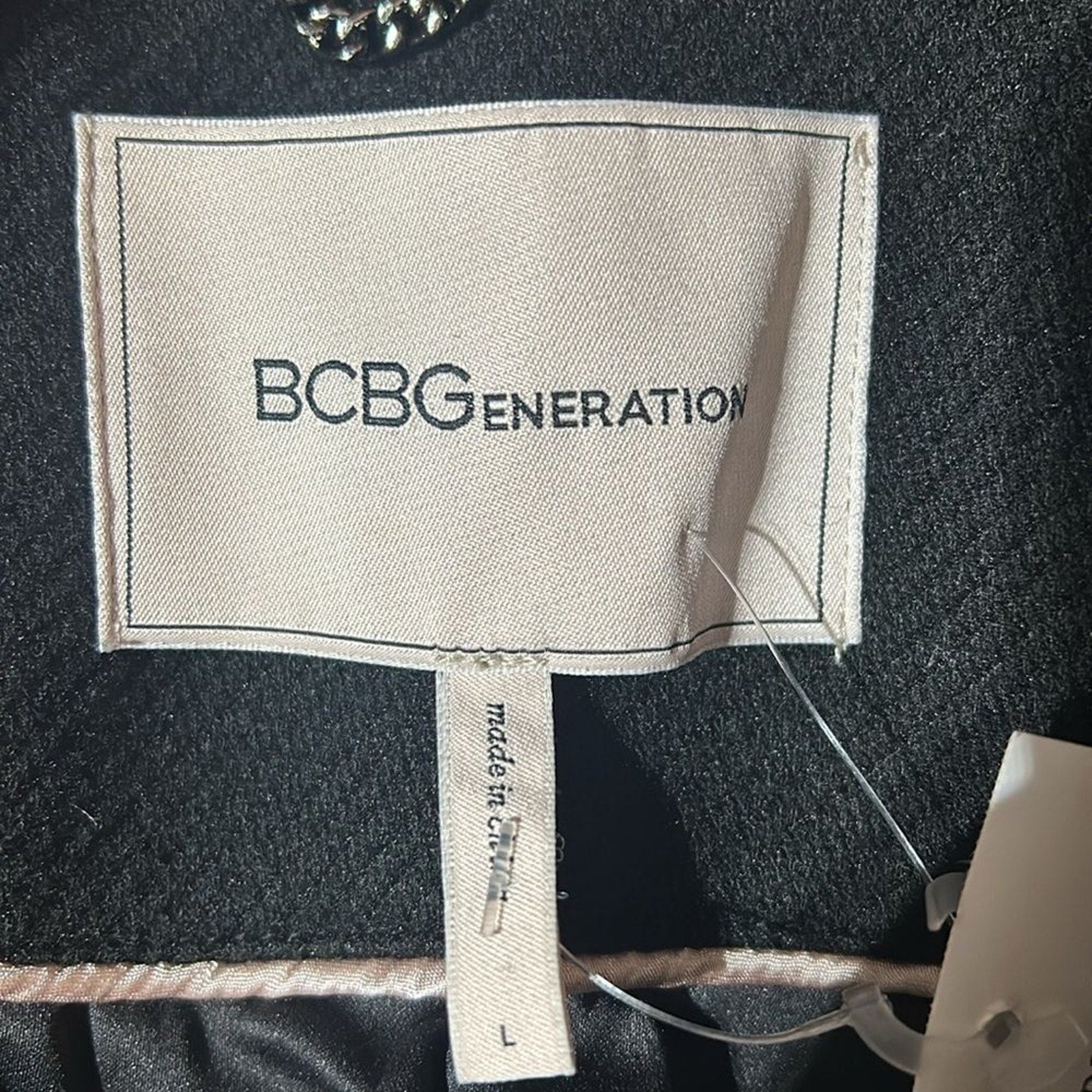 NWT BCBGeneration Peak Lapel Double Breasted Coat in Black - size Large
