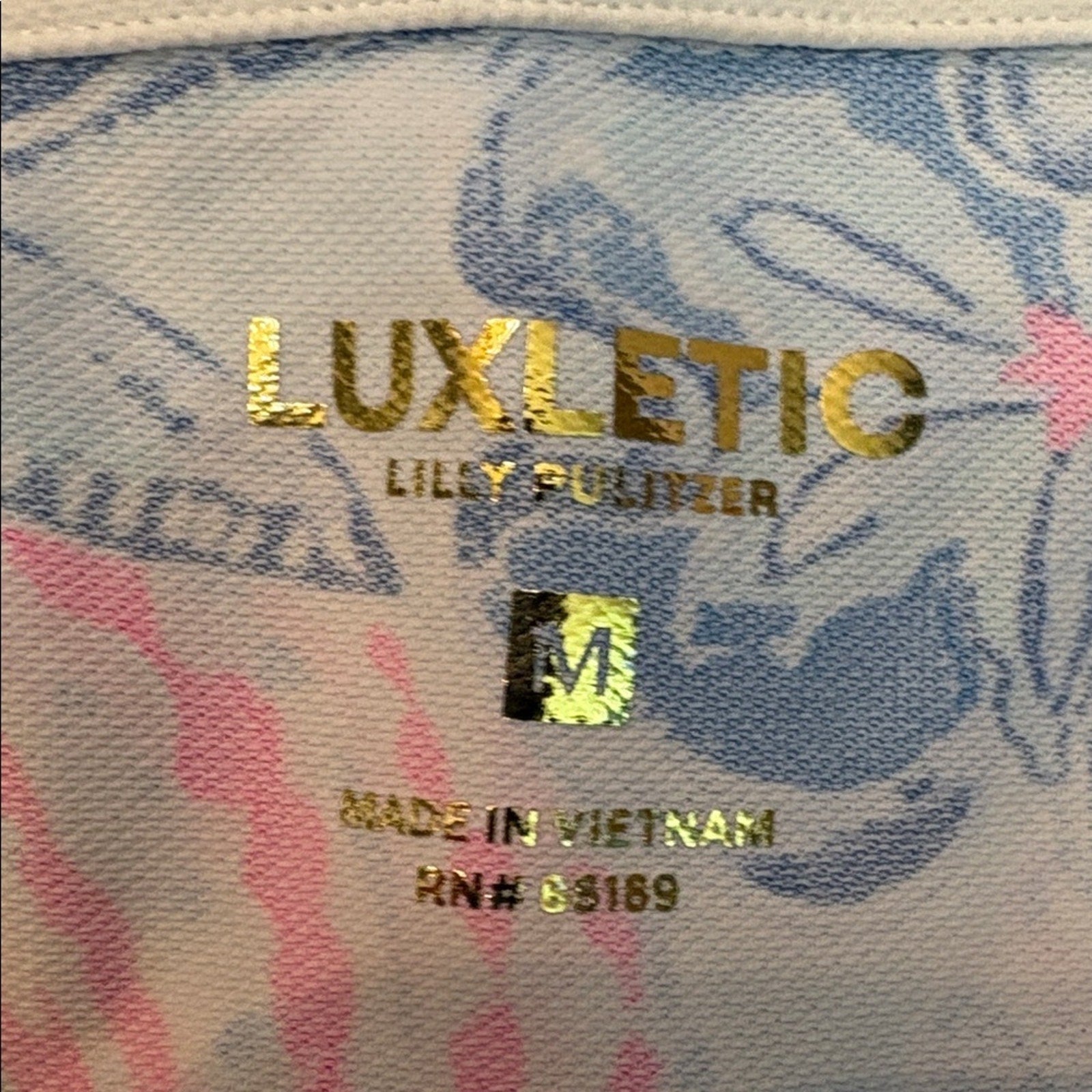 LILLY PULITZER BAHAMAS BEACHCOMBER LUXLETIC IMARA POLO TOP UPF 50+ - size M